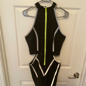 Sleeveless zip up romper with side slits